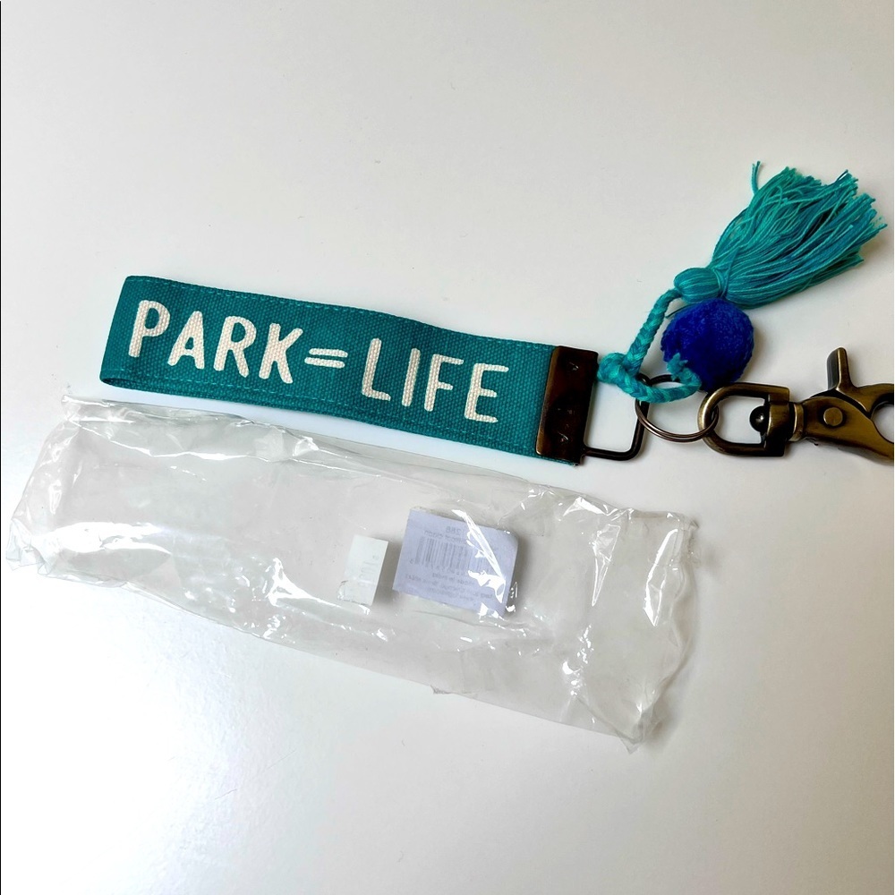 Dog lover keychain.‎ ‘Park=Life.’ Antique brass clip. Pompoms.